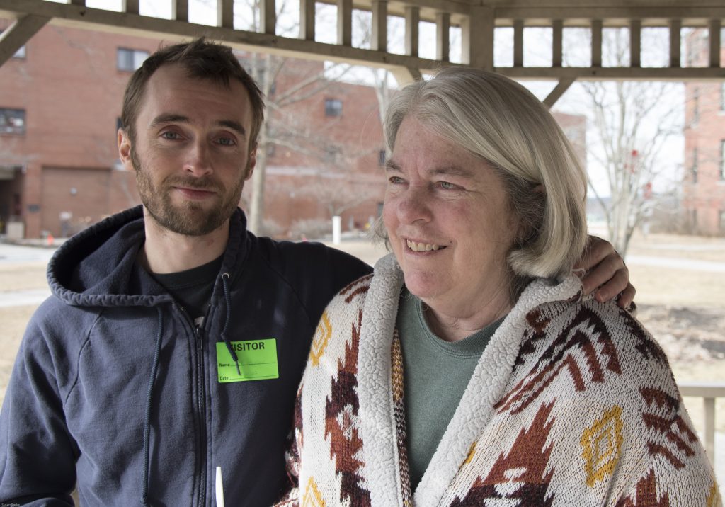 zach and his mother, terry, outside for a walk.