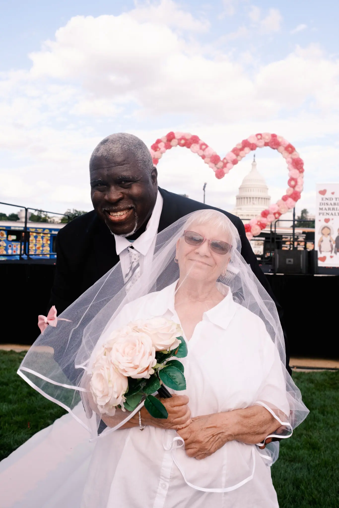 Ricardo and Donna Thornton, dressed as bride and groom
